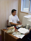 Corey Meekis working at his desk.