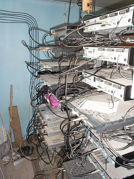 Behind the cable equipment racks.