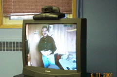 Archie Meekis (at the Deer Lake Band office) as seen from the KO Board room in Sioux Lookout