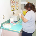 And here she is packing the sterilized equipment. Getting it all ready for use.