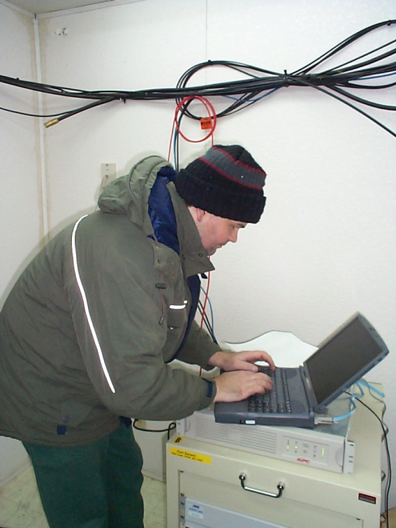 Adi Linden working to configure and test the system with team members, Dan Pellerin who travelled to Fort Severn and Slate Falls
