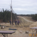 Raising the teepee in preparation for our picnic after clean up. YUMMEEE...