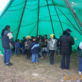 Grade 1 sitting in the teepee away from the wind