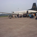 Evacuees waiting to board the plane
