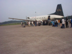 Evacuees waiting to board the plane