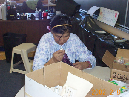 Claudia helps teach the kids in our school about beadwork and other traditional activities.