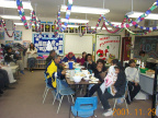 some of Deer Lake's elders havin a meal in the grade 6 classroom.