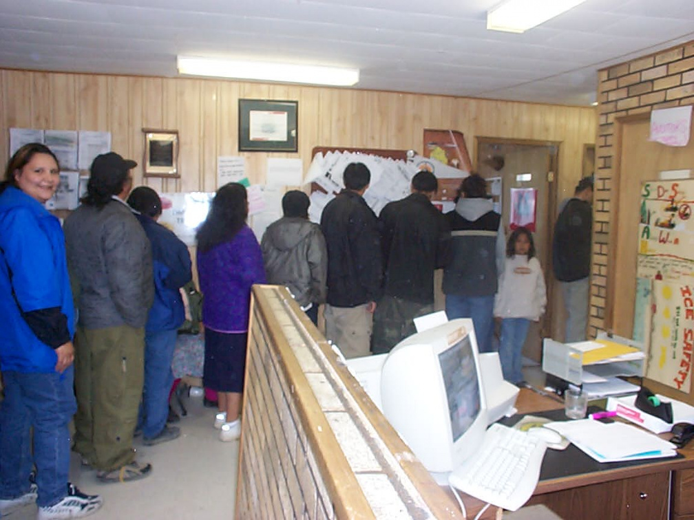 The line went right from the Chief and Council's office right outside. Good thing Treaty Days are during the warm weather.