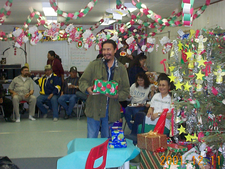 David Meekis, Education Authority member, passed out all the gifts.