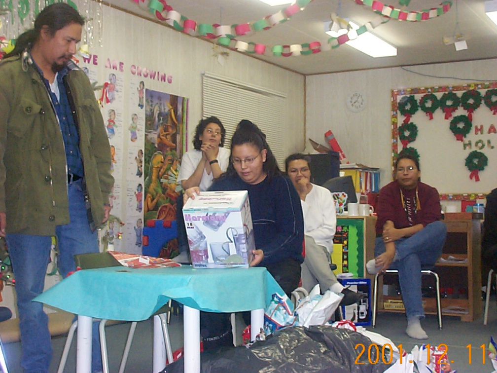 Sonya Nothing, our very own CAP worker, opens her gift.