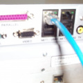 The ethernet cable connects to the "NET 1" port on the IDC SRA2100 DVB IRD. The other end of this ethernet cable needs