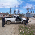 This is Peter Morriseau, and Roland Meekis putting garbage in Edwins truck. im sure if you look in the Keewaywin photos you will