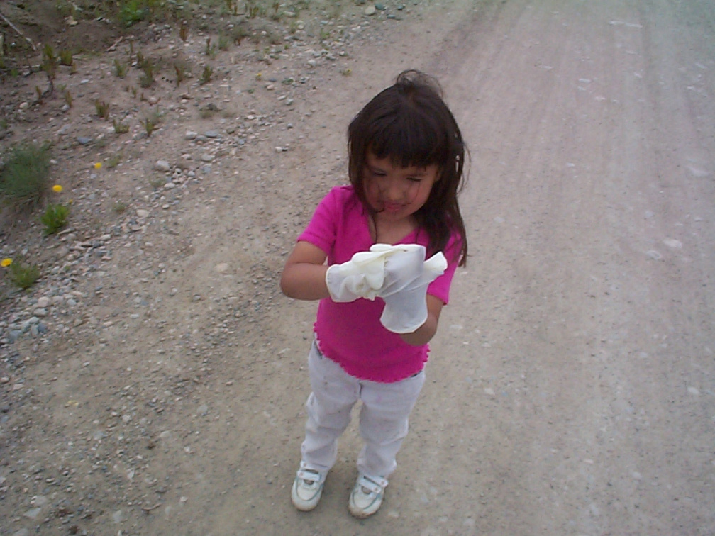 Another little helper putting on some gloves.
