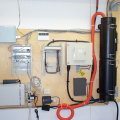 The splice enclosure mounted to the wall and fiber run to the transceiver for the wirless radio.