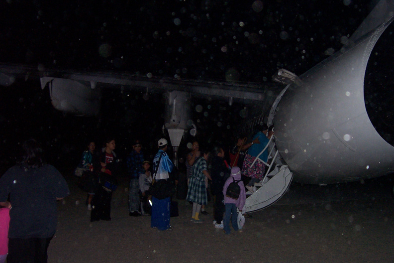 The camera must be dirty. i see spots anyways here is another photo of people getting on the plane.