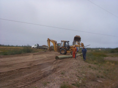 A new hydro pole arrives at the scene.