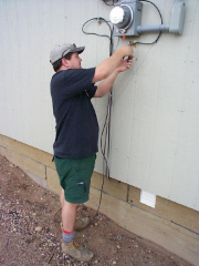 Taking final measurements at various end points around the community.