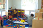 Children playing with toys and making new friends.