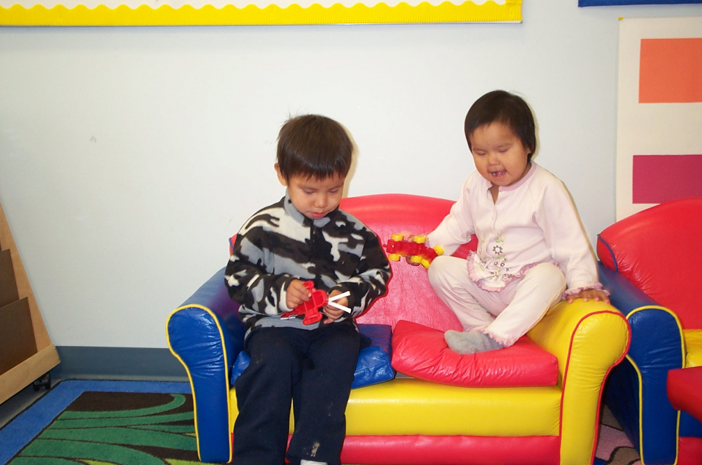Isaiah and Chayla take a seat while they were playing.