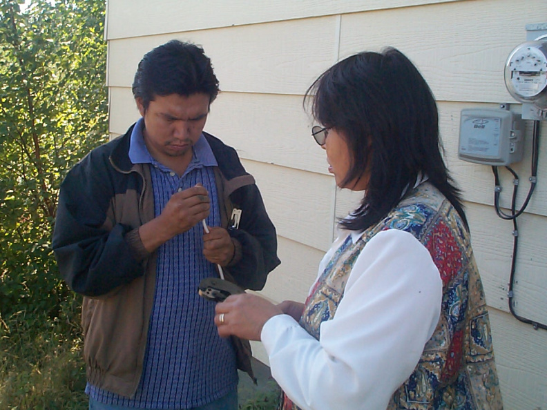 here we can observe as Paul and darlene prepare the cable for internet connection.