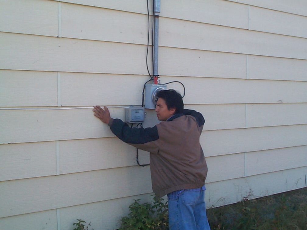 In this pic you can see that we were securing the white cable along the wall.