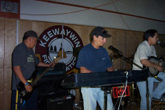 Rennie plays a mean keyboards. And on the left is Brian Anishinabe on guitars.