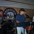 Rennie plays a mean keyboards. And on the left is Brian Anishinabe on guitars.