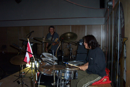Conroy Kakepetum on drums and vocals