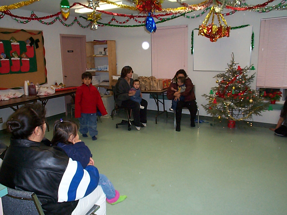 Parents and their children are just starting to arrive for the party.