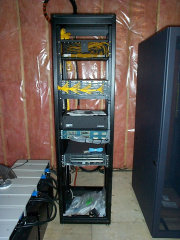 The rack with the network equipment that makes the fiber &quot;tick&quot;.