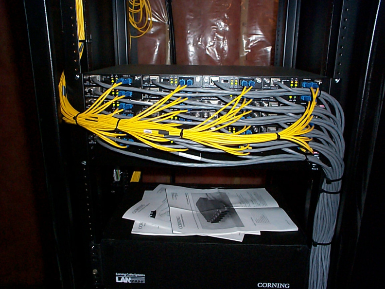 The media converters convert the signal between the fiber pairs (100base-FX) and CAT5 copper (100base-T).