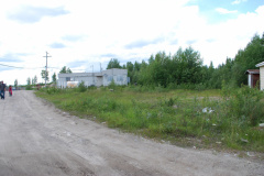 road to be pushed in between buildings to tower