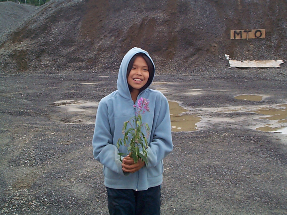 Here is Dancine Rae holding a Fire-Weed.