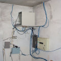 The furnace room after the router had been moved into the rack.
