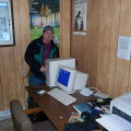 Hugh connecting the cable modem at the Bandoffice.