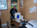 Hugh connecting the cable modem at the Bandoffice.