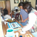 Paul and Darlene serve cake to the masses.