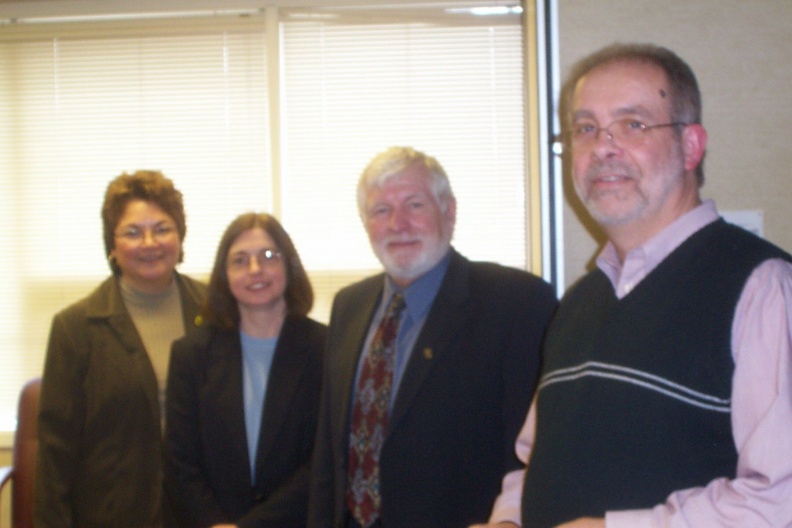 Oshki-Pimache-O-Win Education and Training Institute and Lakehead University sign a partnership agreement on November 13, 2002.