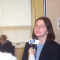 Mary Louise Hill answering questions from a local reporter of Thunder Bay Television.