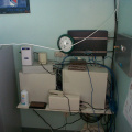 The K-Net Router (DirecPC box), dialin router, Cisco router and other network equipment at the Poplar Hill school before the cab