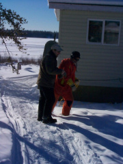 Ivan and Roy (Blair crew) are rolling out an extension cord to test connectivity with a cable modem at the far ends of the commu