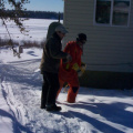 Ivan and Roy (Blair crew) are rolling out an extension cord to test connectivity with a cable modem at the far ends of the commu