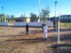 Heer we can see a couple of the high-school students outside playing a bit of volleyball.