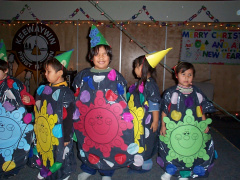 These little snowflakes and icicles did a school play and sang We wish you a Merry Christmas.