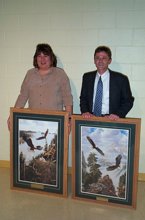 Wahsa Distant Education School Principal presented Sioux Mountain School with two beautiful paintings to decorate the halls of t