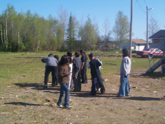 Here we see them playing a game of kick-ball.