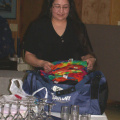 Gibbet Stevens, Telehealth Communications Coordinator for KO, organizing T-shirts for presentation.