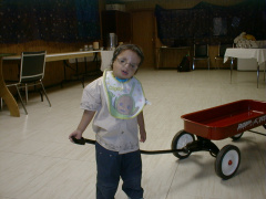 Great picture of Sam pulling his wagon
(submitted by Angela Nickoloff of NORTH Network).