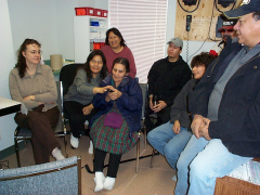 An elder from the community trying out the new telehealth equipment.