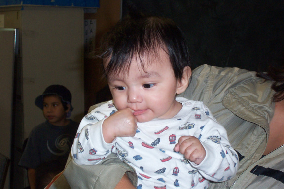 Here is Carries baby sucking on his finger. Mmmmmm good!! Mmmmmm its real good. yum yum!!